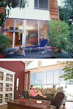 Moderne Jalousien an großen Fenstern bieten Sichtschutz und Sonnenschutz im Wohnzimmer.